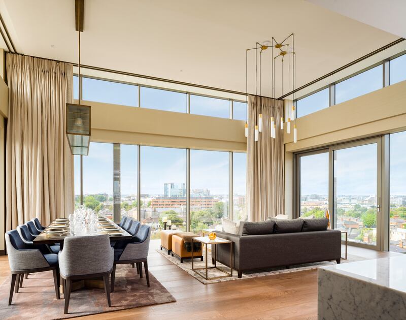Double height living-dining area in the penthouse at Lansdowne Place.