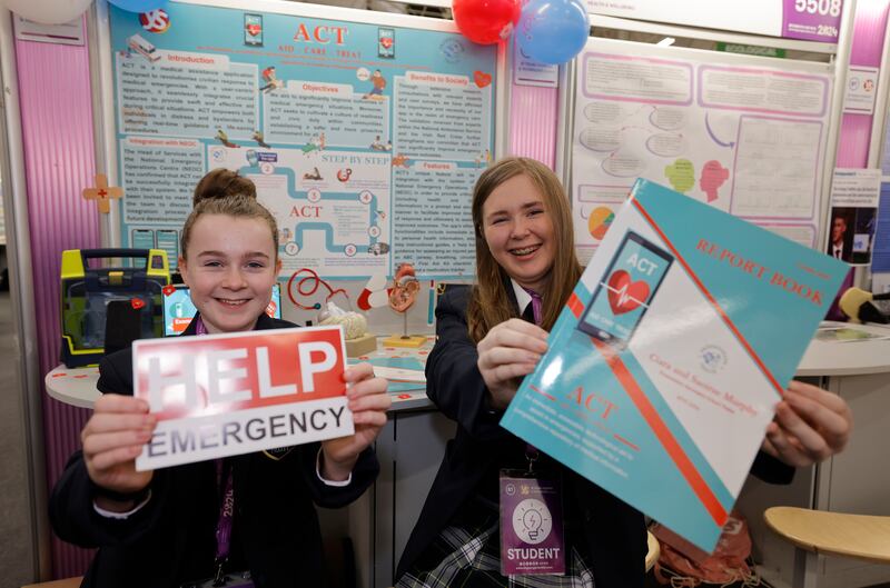 Saoirse and Ciara Murphy from Presentation Secondary School Tralee with their project ACT (Aid, Care, Treat) a technological aid to assist in emergencies. Photograph: Alan Betson

