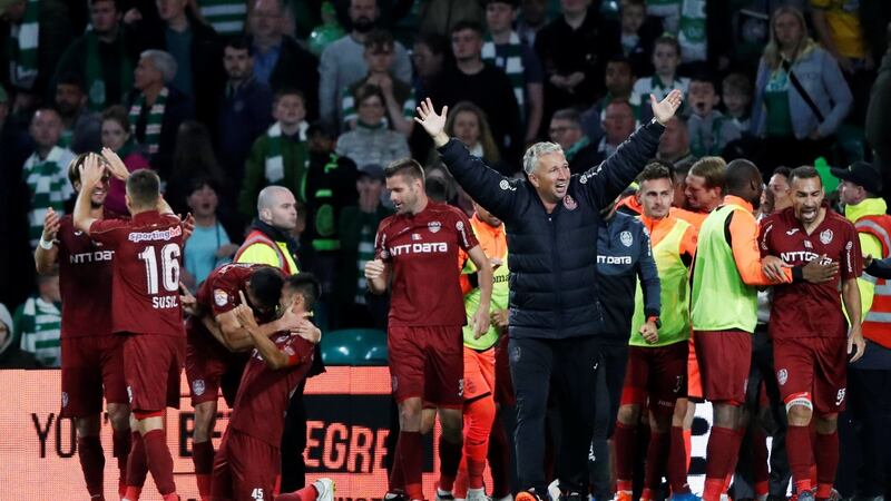 CFR Cluj coach Dan Petrescu celebrates after the match. Photo: Russell Cheyne/Reuters