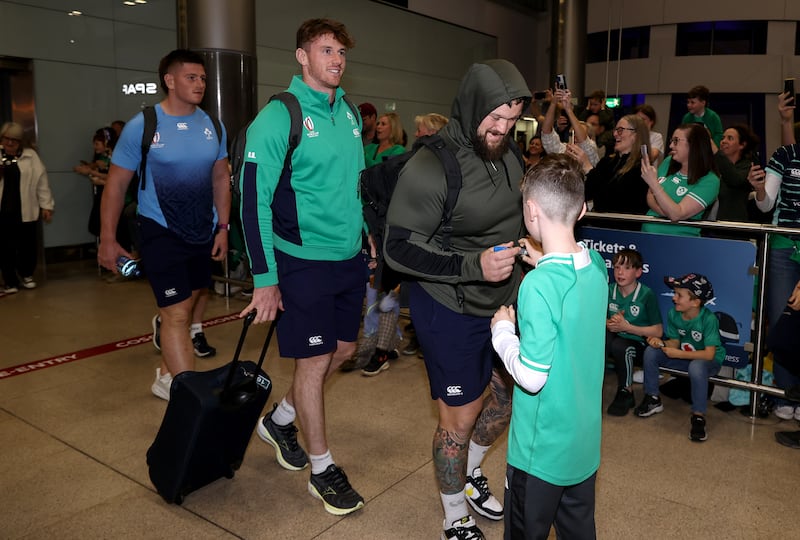 Ireland’s Andrew Porter with a young fan at Dublin Airport. Photograph: INPHO/Ben Brady