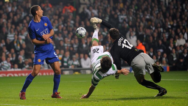 Cillian Sheridan tries an overhead kick in the Champions League game against Manchester United at Celtic Park in November 2008. Photograph:  Matthew Ashton/AMA/Corbis via Getty Images