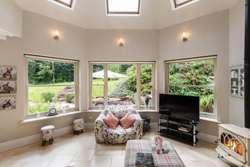 The rear of the house overlooking the extensive back garden.