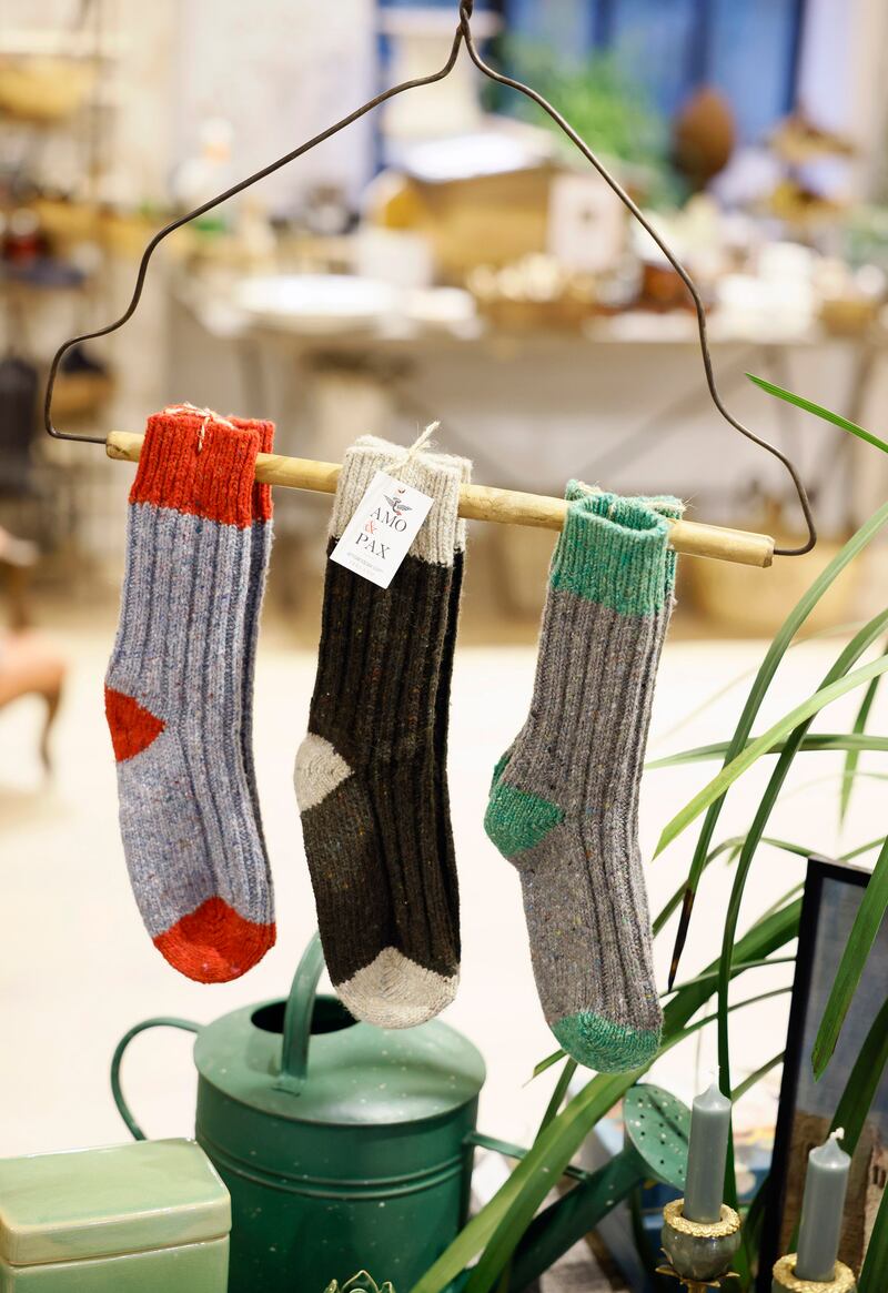 Socks and watering cans at Amo & Pax. Photograph: Kieran Harnett