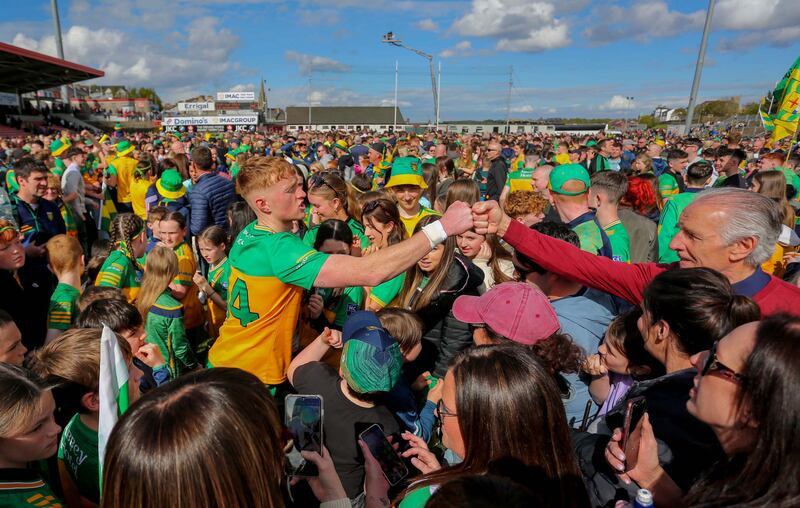 Donegal's Oisin Gallen surrounded by fans at the end of the game against Tyrone. Photograph: Lorcan Doherty/Inpho