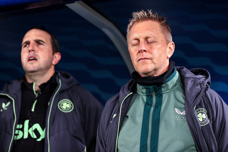 Ireland's Manager Heimir Hallgrímsson and assistant John O'Shea during the national anthem in Helsinki. Photograph: Ryan Byrne/Inpho