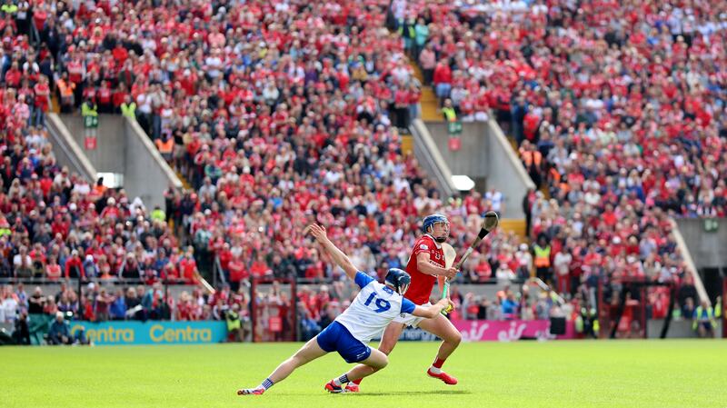 Waterford’s Kieran Bennett challenges Cork's Diarmuid Healy. Photograph: James Crombie/Inpho