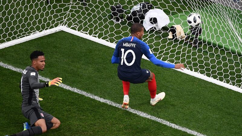 Kylian Mbappe turns home France’s winner against Peru. Photograph: Jewel Samad/AFP