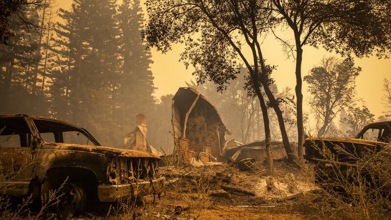 The remains of a burned home in Santa Cruz County, California. Photograph: Philip Pacheco/Bloomberg