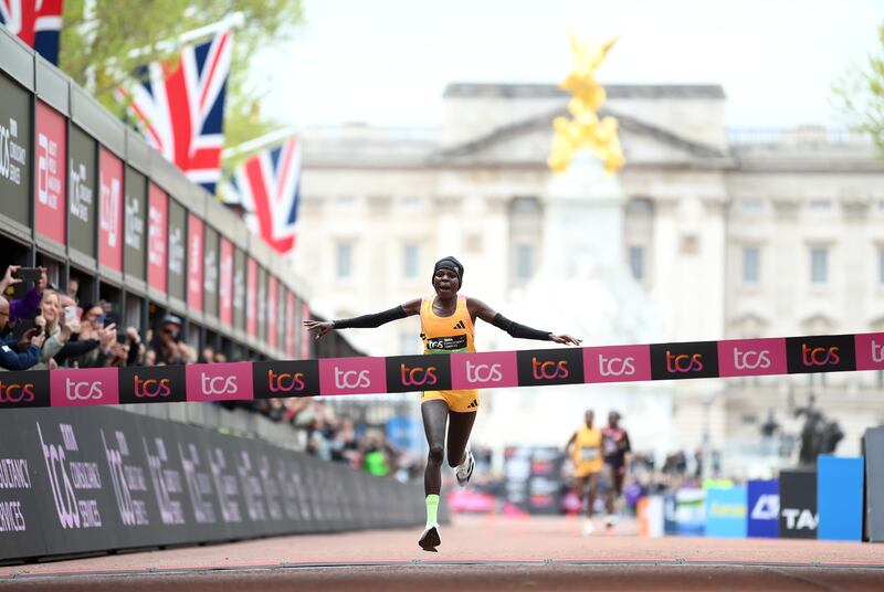 Peres Jepchirchir of Kenya crosses the finish line to win the Women's elite race and setting a new world record during the London Marathon. Photograph: Alex Davidson/Getty Images