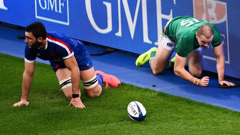 France’s flanker Charles Ollivon  and Ireland’s fullback Jacob Stockdale react after Stockdale’s mistake that led to France’s penalty try. Photograph Franck Fife/AFP via Getty Images