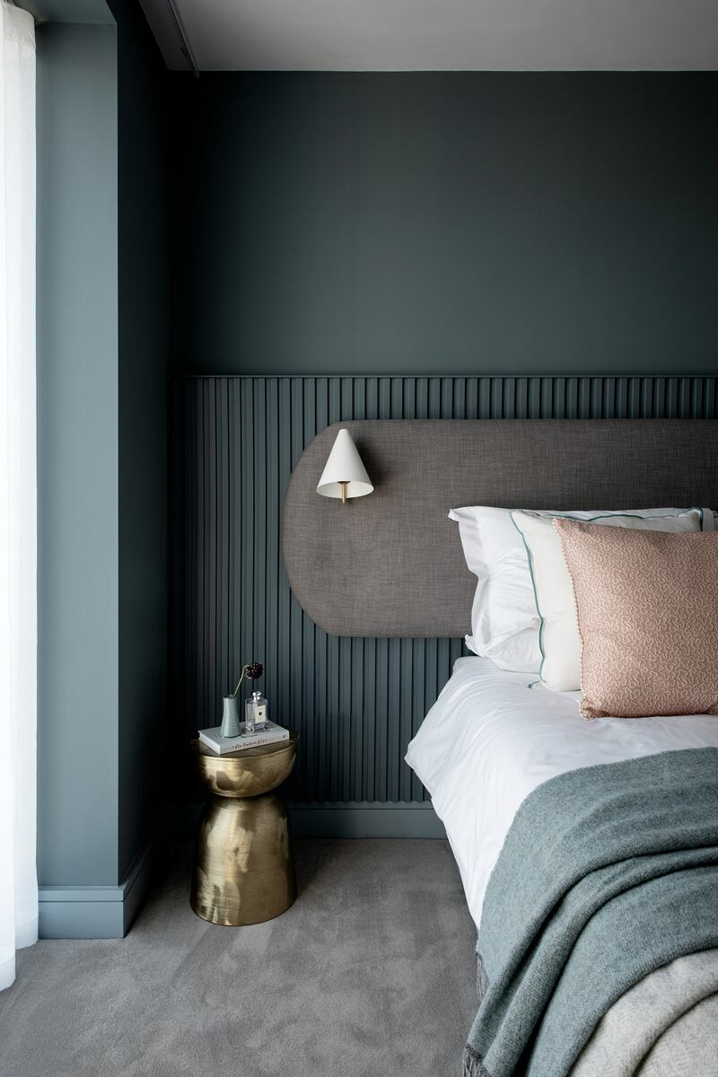 Panelling can be a lovely feature in the bedroom as a backdrop to a bed, used with or instead of a headboard. Photograph: Ruth Maria Murphy