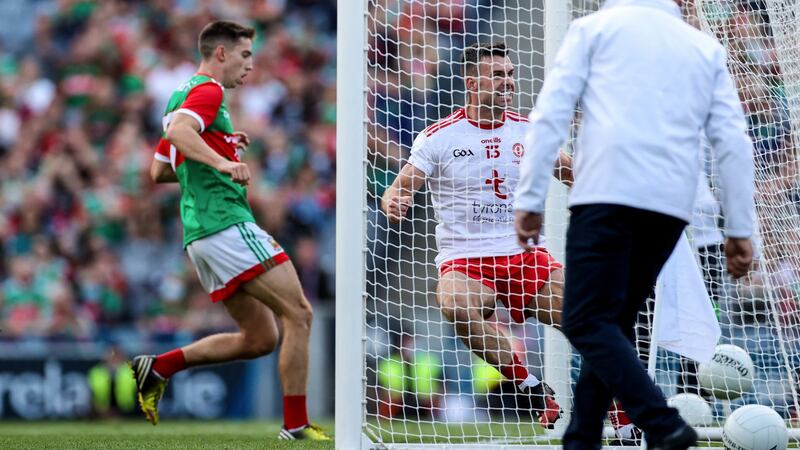 Darren McCurry celebrates after scoring the second goal. Photo: James Crombie/Inpho