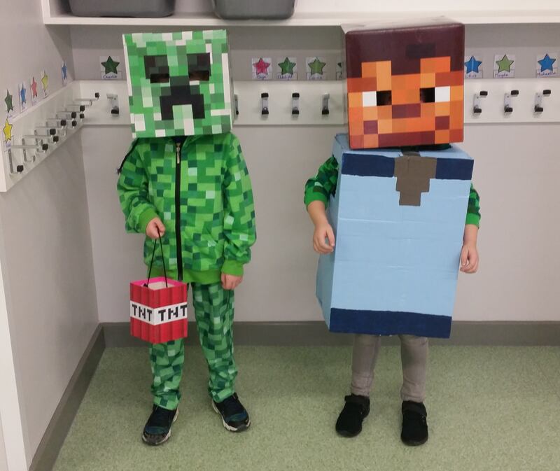 Kevin Rave as a Creeper from the video game Minecraft together with his best friend M.P. dressed as the player character Photograph: Gosia Konior