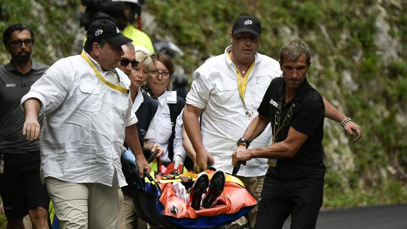 Richie Porte is evacuated after falling during stage 9. Photo: Philippe Lopez/Getty Images