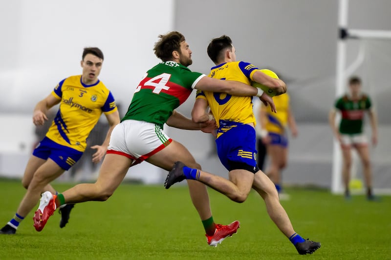 Roscommon’s Brian Stack with Aidan O’Shea of Mayo. Photograph: Morgan Treacy/Inpho