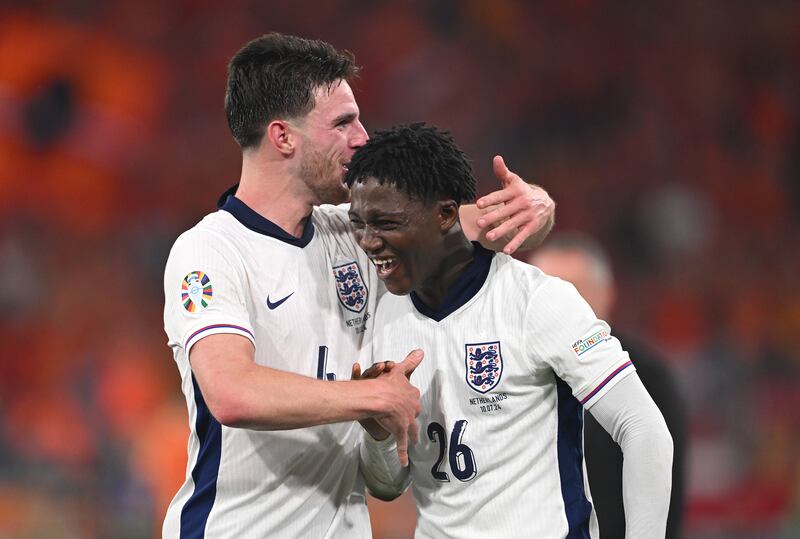 England players Declan Rice and Kobbie Mainoo celebrating victory over the Netherlands. Photograph: Stu Forster/Getty Images