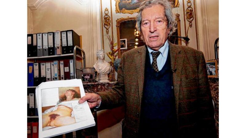 Jean-Jacques Fernier with reproductions of L'Origine du Monde and the newly-found portrait. photographs: getty images, reuters