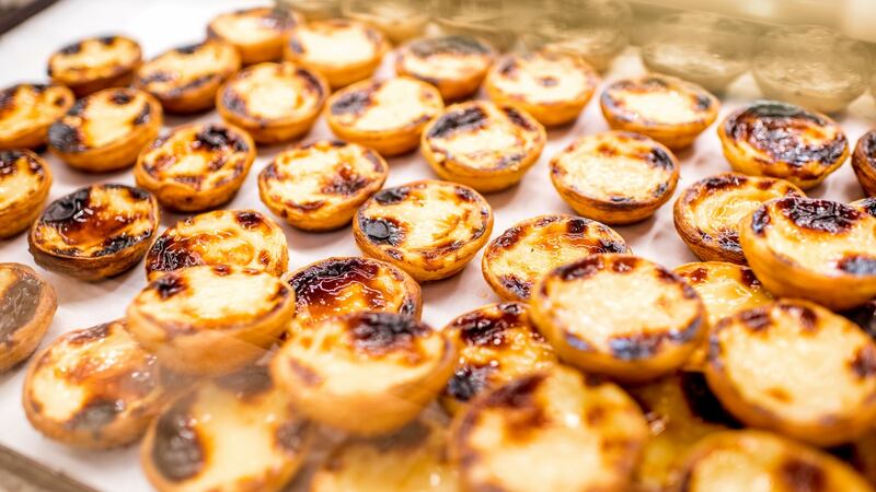 Pasteis de nata is a custard-filled pastry which the monks used to make with leftover egg yolks.