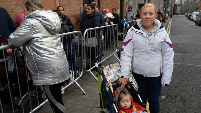 Carol-Ann Byrne, with baby Carson, at the Capuchin Day Centre. Photograph: Dara MacDónaill/The Irish Times