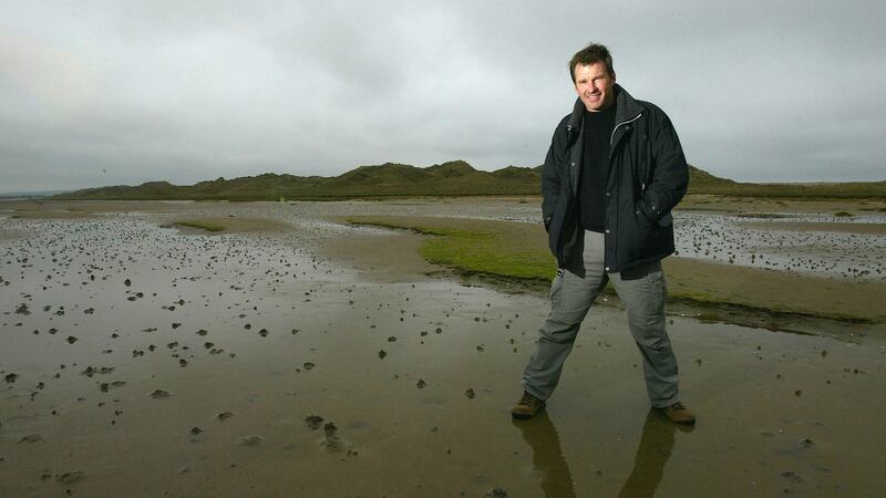 Bartragh Island can only be reached by foot by a tombolo that becomes visible as the tide goes out. Nick Faldo photographed at the island in 2004. Photograph: Andrew Redington/Getty Images