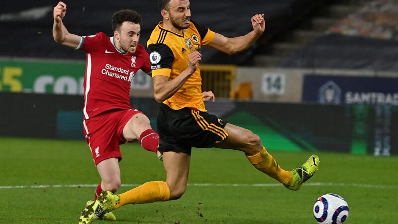 Liverpool striker Diogo Jota  scores the opening goal during the  Premier League match against his former side Wolves  at Molineux. Photograph: Paul Ellis/AFP via Getty Images