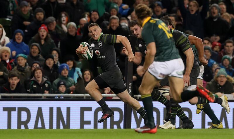 Andrew Conway burns through to score after the Springboks failed to secure a Conor Murray nox kick. Photograph: Brian Lawless/PA
