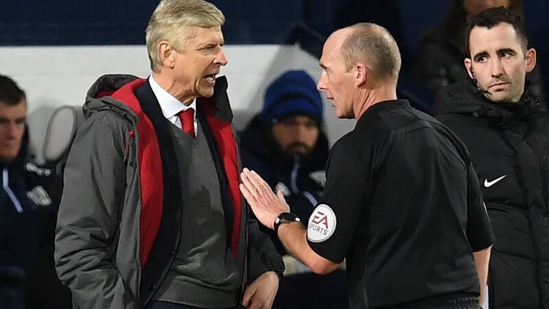 Arsene Wenger was unhappy with Mike Dean’s decision to award West Brom a late penalty at the Hawthorns. Photograph: Paul Ellis/AFP