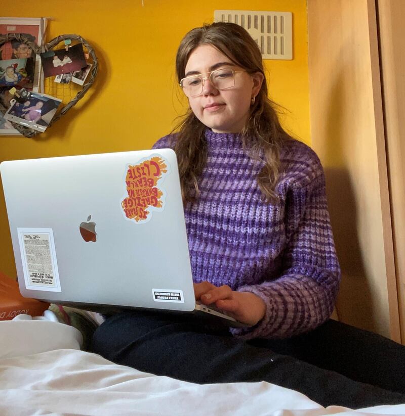 Neasa Clancy, a UCD history student, at a lecture at home