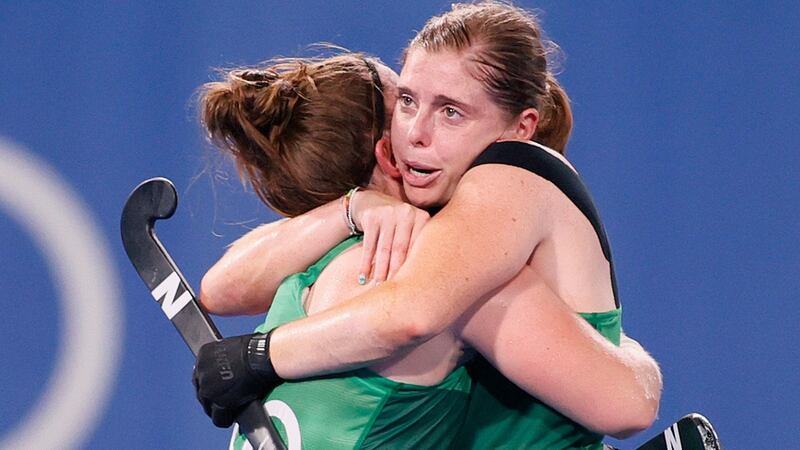 Shirley McCay and Kathryn Mullan  embrace following Ireland’s  loss to Britain at Oi Hockey Stadium. Photograph: Steph Chambers/Getty Images