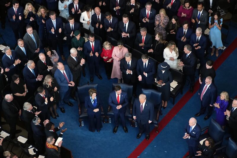 Senator Amy Klobuchar, JD Vance and Donald Trump attend the inauguration ceremonies in Washington DC on Monday. Photograph: Andrew Harnik/Getty Images