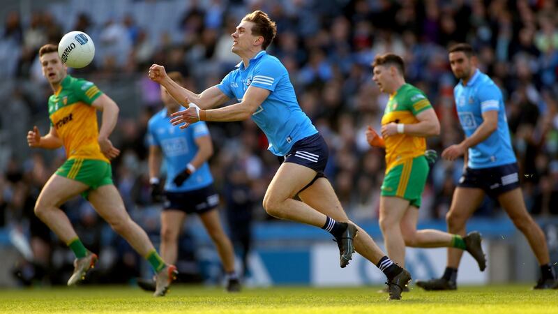 Dublin’s Michael Fitzsimons hand passes the ball during the Allianz Football League Division One game against Donegal at Croke Park. Photograph:  James Crombie/Inpho