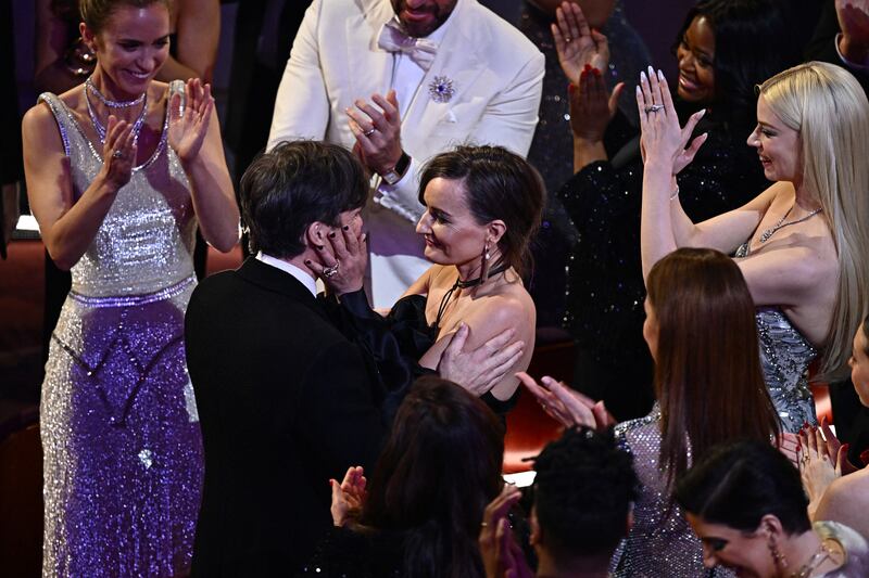 Cillian Murphy celebrates with his wife Yvonne McGuinness after he was announced as best actor in a leading role for Oppenheimer. Photograph: Patrick T. Fallon/AFP/Getty Images