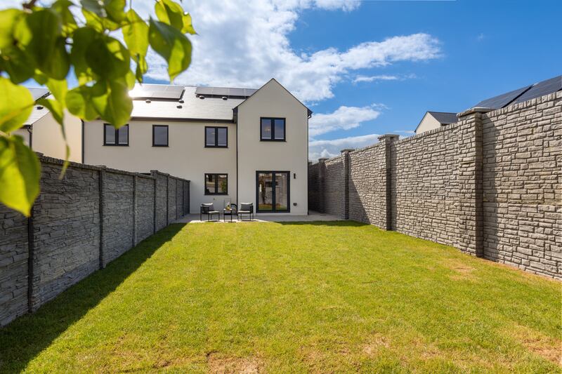 Back garden of four-bed