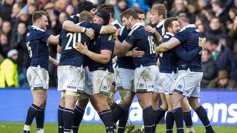Scotland celebrate the full time whistle.