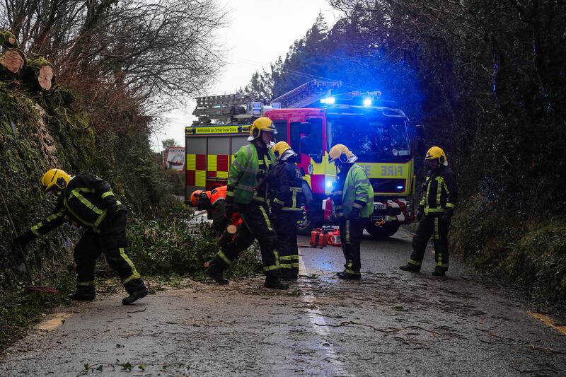 Kerry County Fire Services felling a tree during Storm Isha. Photograph: Valerie O'Sullivan