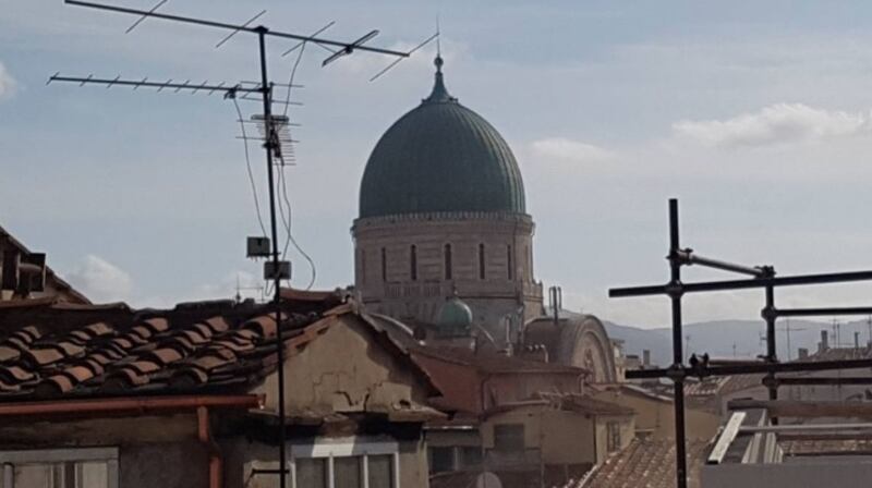 This 75sq m (807sq ft) Italian apartment is on the top  floor of a 19th century building.
