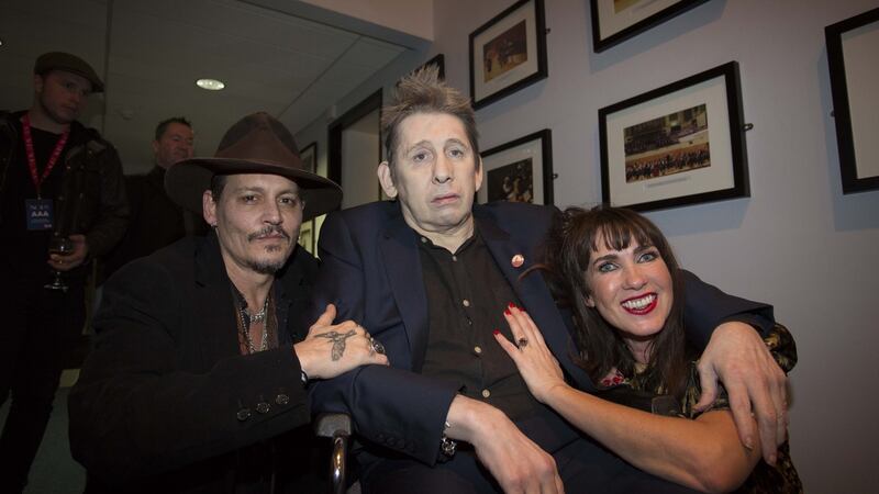 Johnny Depp with Shane MacGowan and Victoria Mary Clarke at MacGowan’s   60th Birthday Celebration in the National Concert Hall, Dublin, in January. Photograph: Tom Honan/The Irish Times