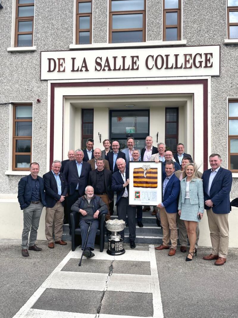 The De La Salle Churchtown rugby team that won the Leinster Schools Senior Cup in 1983 pictured at Friday’s reunion as part of De La Salle day. Also pictured is the 1983 coach Brian Farley (seated) and current principal Siobhan Foster