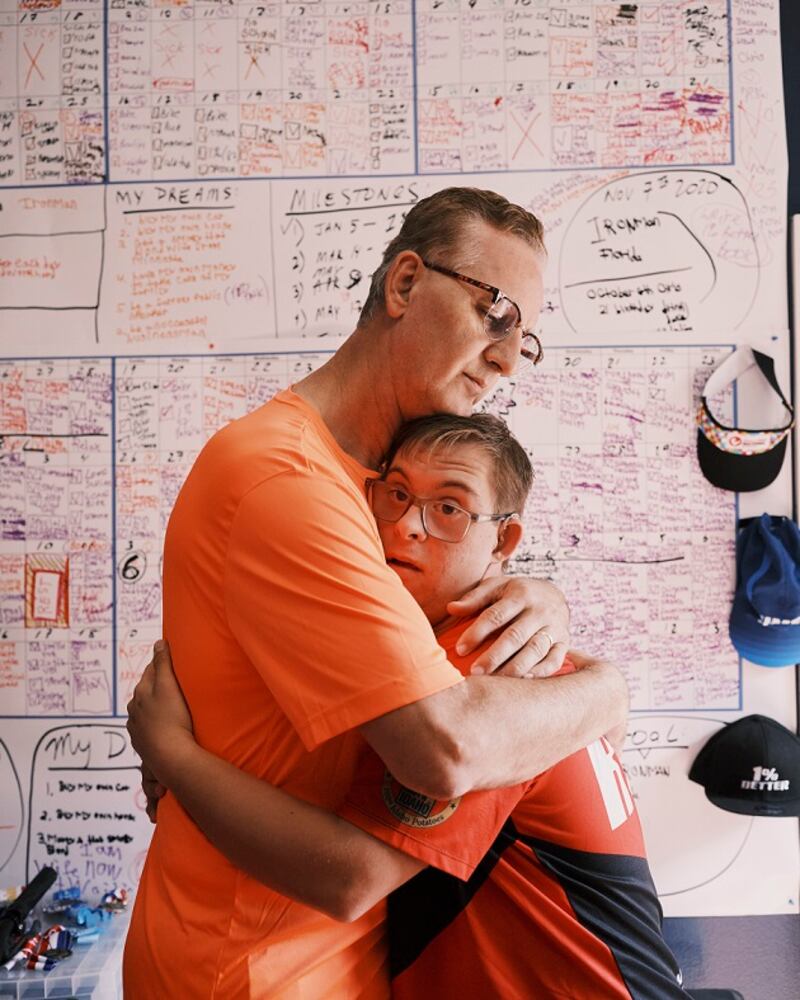 Chris Nikic with his father Nik at their home in Maitland, Florida. Photograph: Zack Wittman