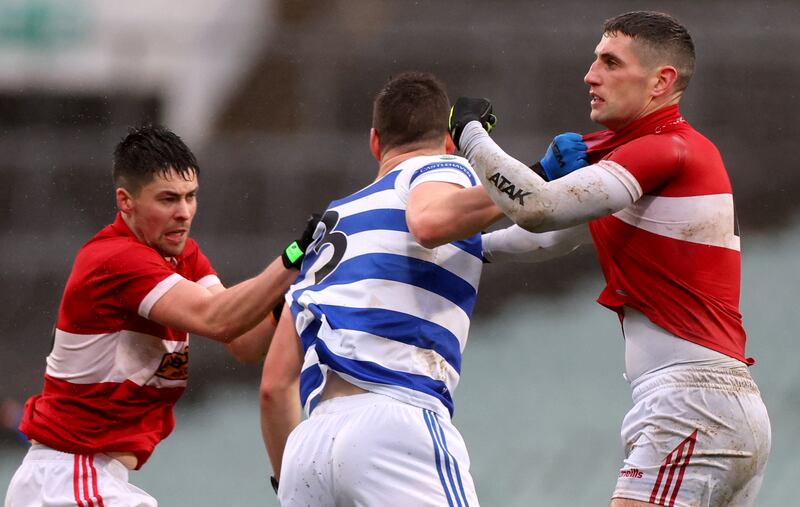 Dingle’s Dylan Geaney and Paul Geaney with Rory Maguire of Castlehaven. Photograph: James Crombie/Inpho
