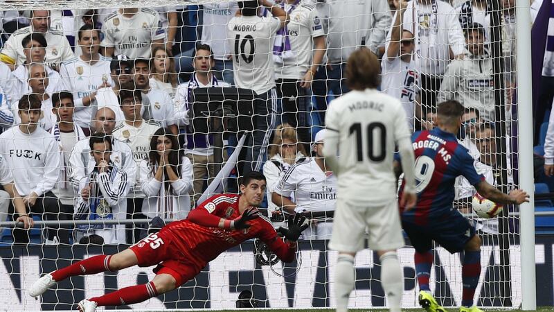 Roger Marti scores a penalty to put Levante 2-0 up. Photo: Javier Lizon/EPA
