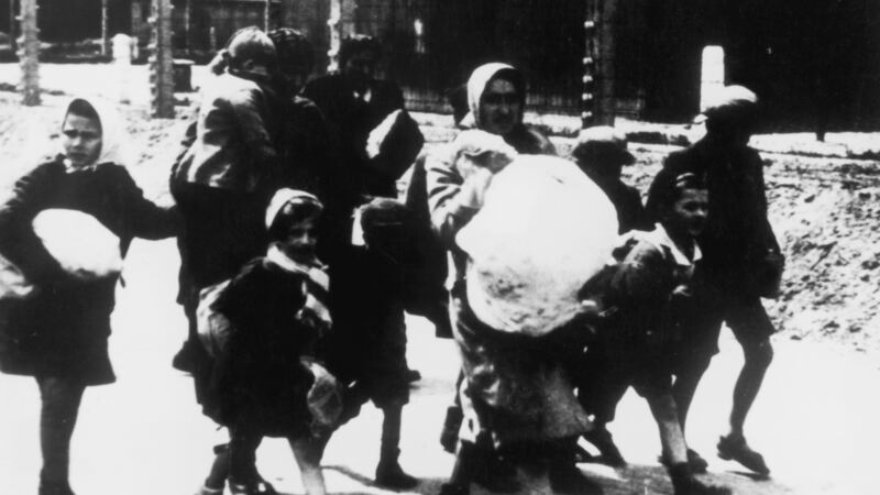 A group of women and children arriving at the Nazi concentration camp at Auschwitz, Poland, circa 1943. (Photo by Three Lions/Hulton Archive/Getty Images)