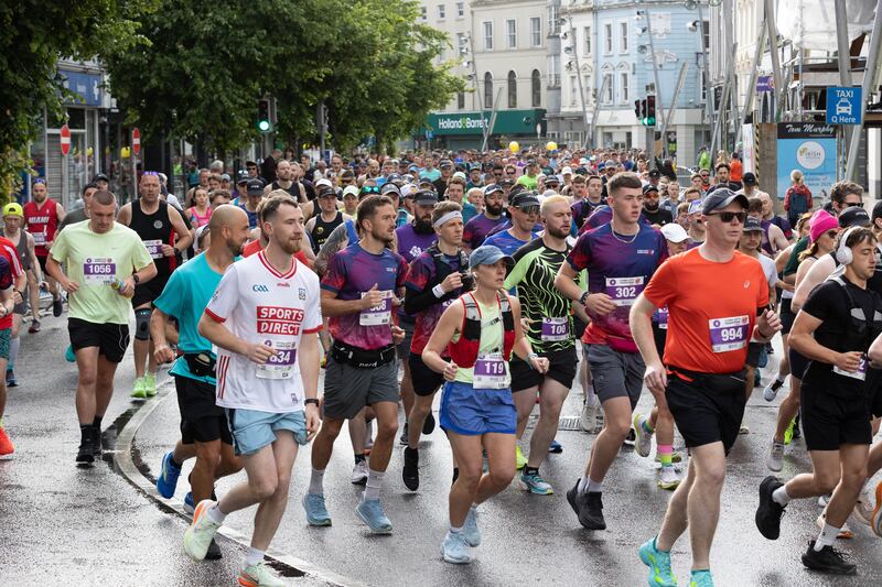 Runners starting the Cork City Marathon 2025. More than 11,000 runners took to the streets across the full marathon, half marathon and 10K events. Photograph: Darragh Kane