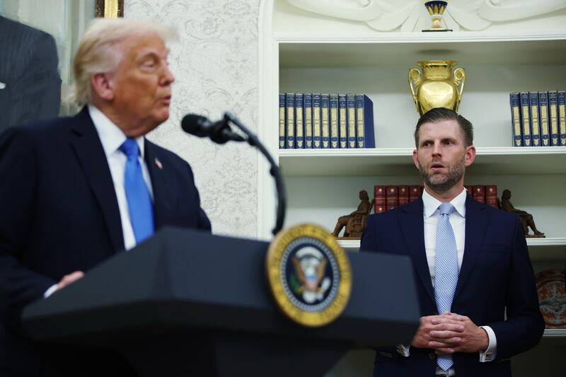 US president Donald Trump and his son Eric Trump, executive vice president of the Trump Organization. Photograph: Samuel Corum/Bloomberg