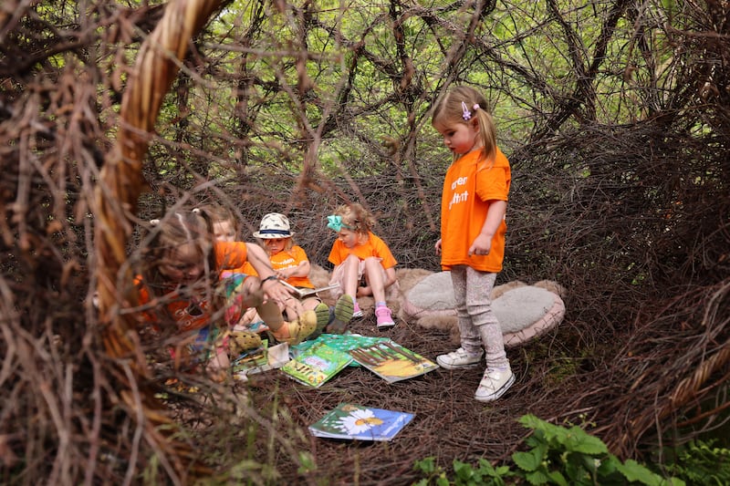 Children from Creative Kids & Co pre-school in Walkinstown, in The First 5 Garden of Wonder and Discovery, designed by children for children. Photograph: Dara Mac Dónaill/The Irish Times