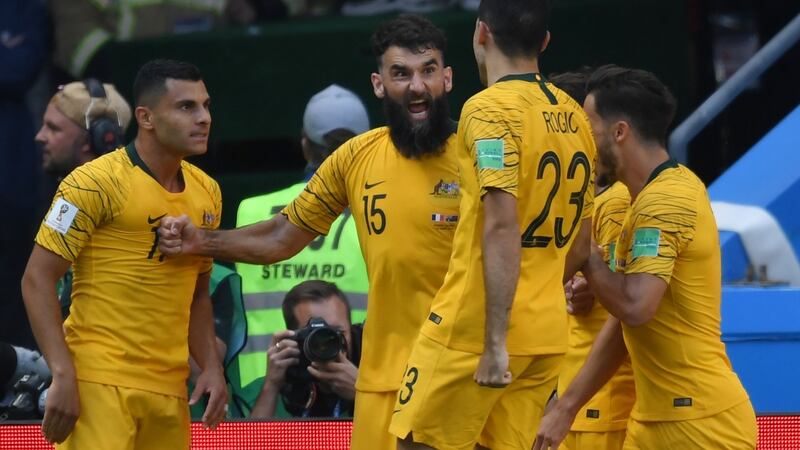 Australia celebrate Mile Jedinak’s equaliser in Kazan. Photograph: Kirill Kudryavtsev/AFP