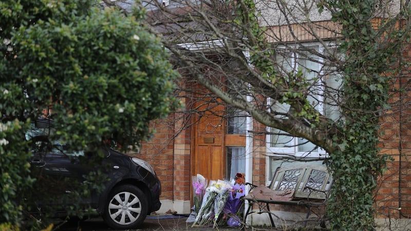 Floral tributes at the front door of the home of George Nkencho, Manorfields Drive, Dublin 15. Photograph: Nick Bradshaw