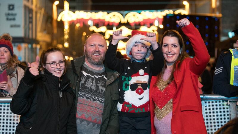 Vicky Phelan with her husband Jim, daughter Amelia and son Darragh, after turning on the Christmas lights in Limerick. Photograph: Sean Curtin/True Media
