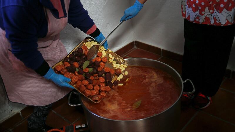 Volunteers cook for the rescue personnel. Photograph: Reuters/Jon Nazca
