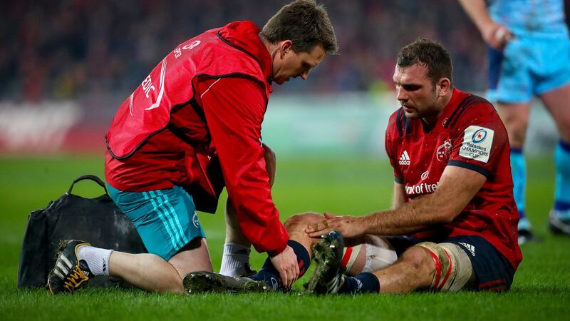 Munster’s Tadhg Beirne lies down injured during their Champions Cup victory over Exeter Chiefs. He will now miss the opening two rounds of the Six Nations. Photo: Oisin Keniry/Inpho